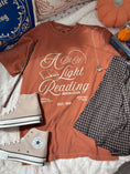 Load image into Gallery viewer, A Bit Of Light Reading Book Club Graphic Tee
